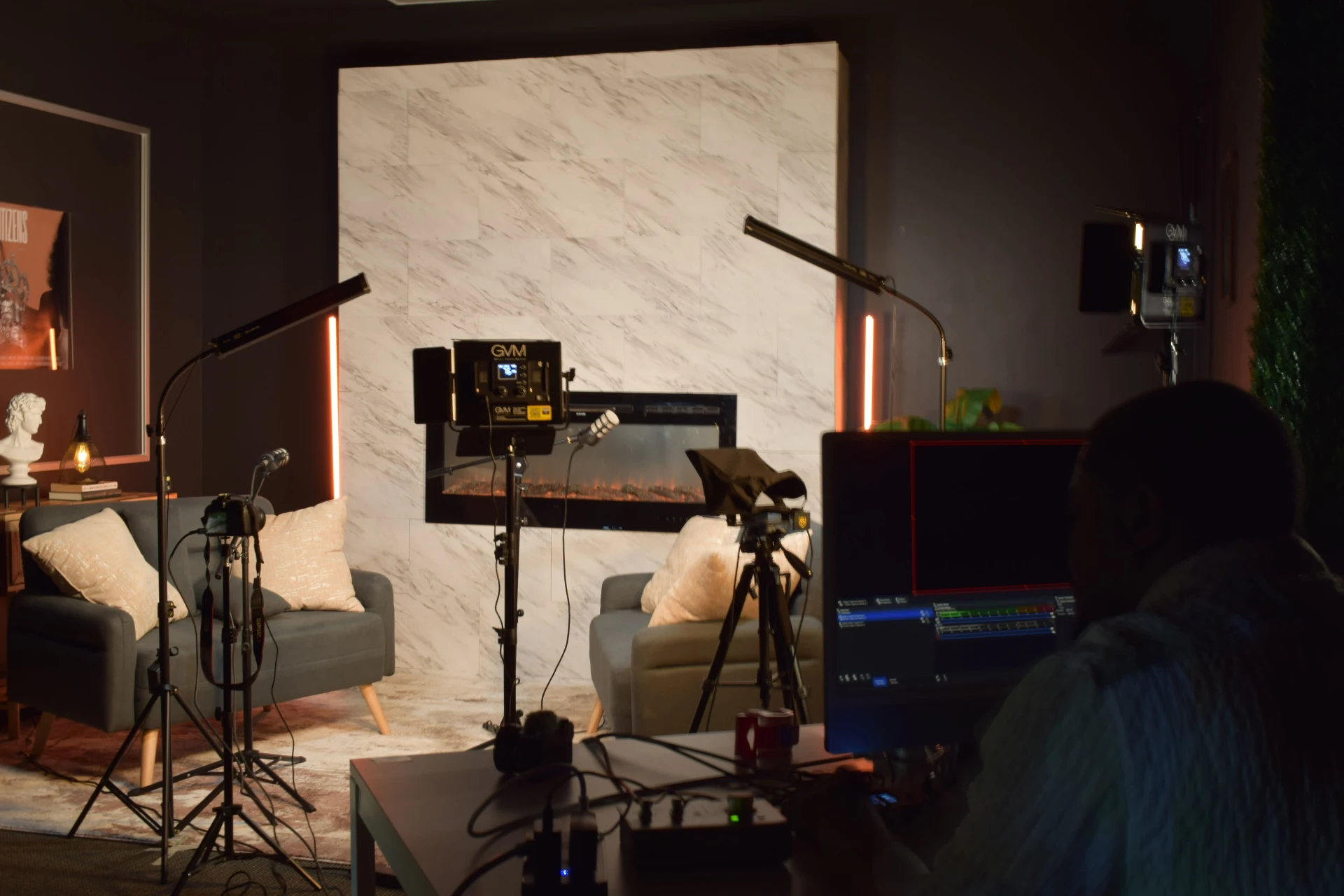 Producer running a session from the desk